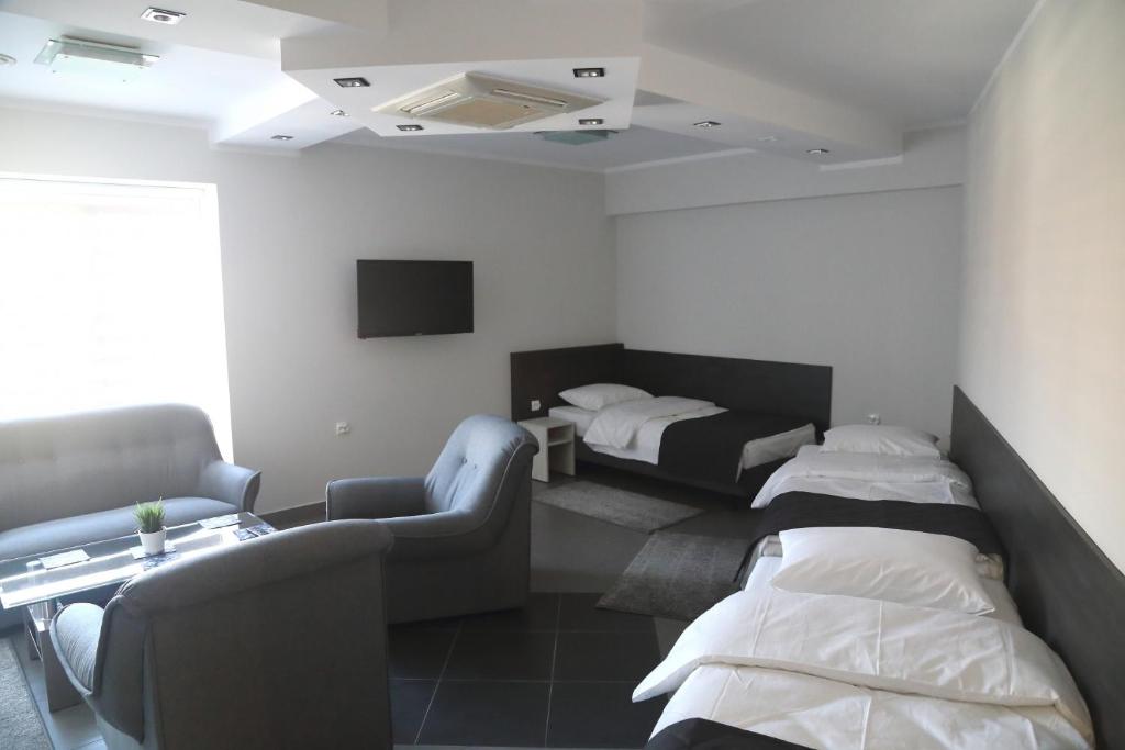 Postel nebo postele na pokoji v ubytování Motel Dymek
