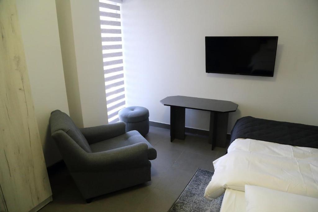 TV a/nebo společenská místnost v ubytování Motel Dymek