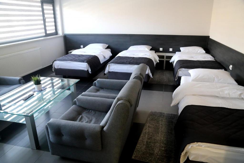 Postel nebo postele na pokoji v ubytování Motel Dymek