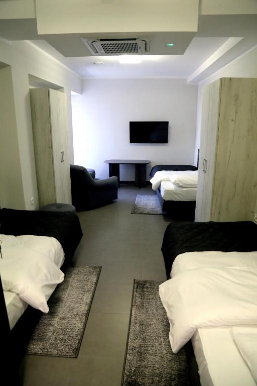 Postel nebo postele na pokoji v ubytování Motel Dymek