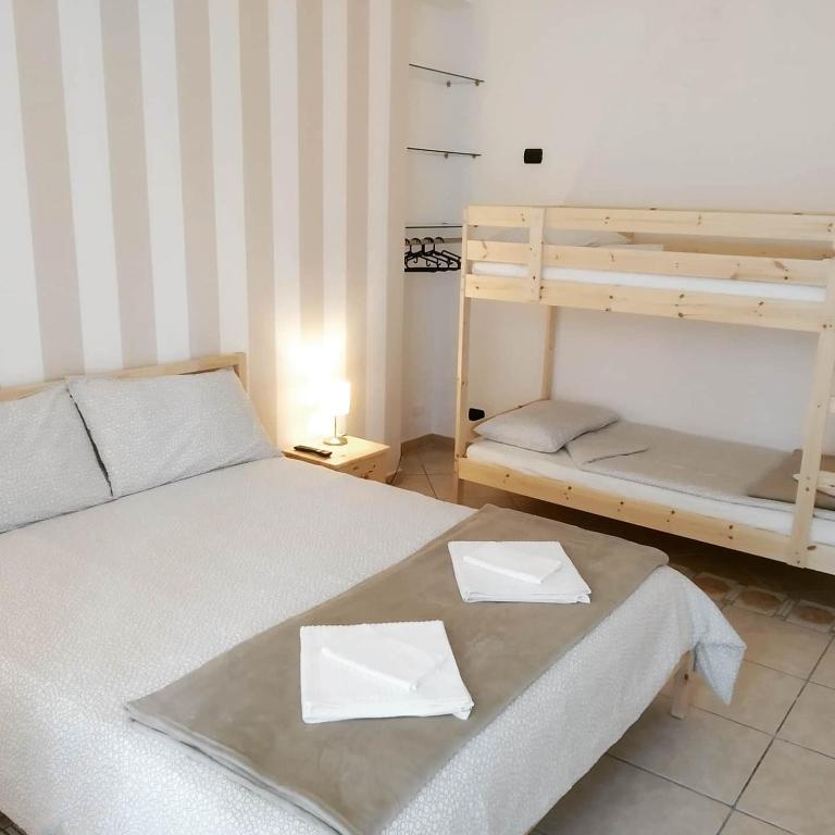 Postel nebo postele na pokoji v ubytování Atelier bed&bed