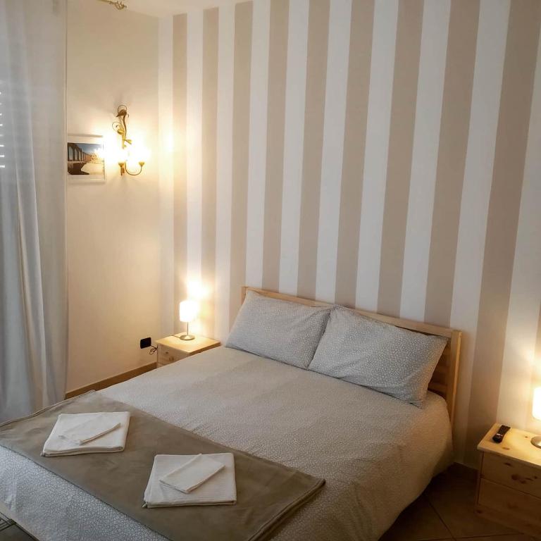 Postel nebo postele na pokoji v ubytování Atelier bed&bed