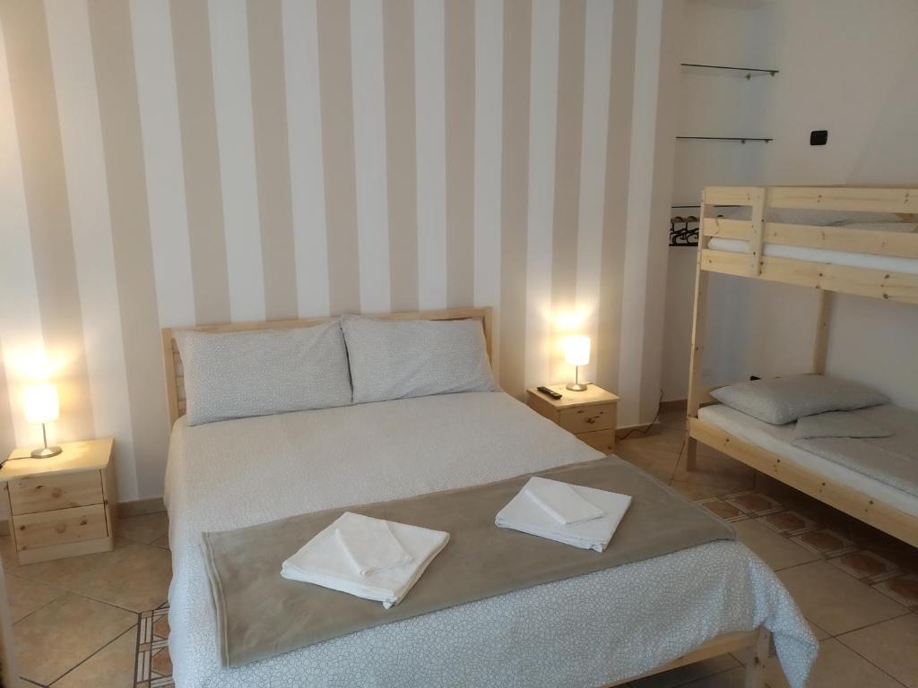 Postel nebo postele na pokoji v ubytování Atelier bed&bed
