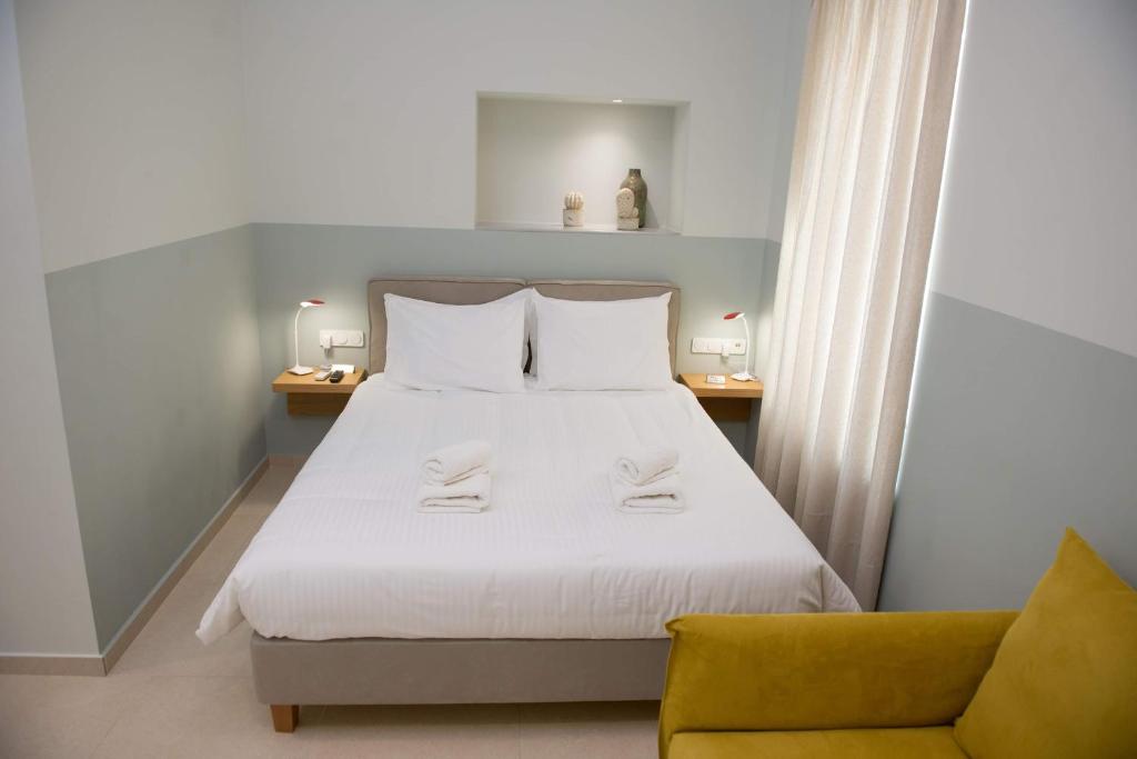 Ένα ή περισσότερα κρεβάτια σε δωμάτιο στο Stylish Studio Apartment - 1 House