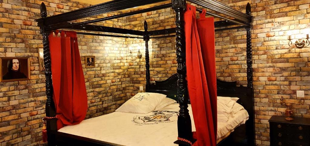 Letto o letti in una camera di Hôtel Renaissance