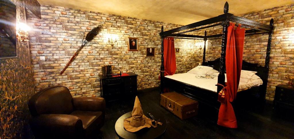 Letto o letti in una camera di Hôtel Renaissance