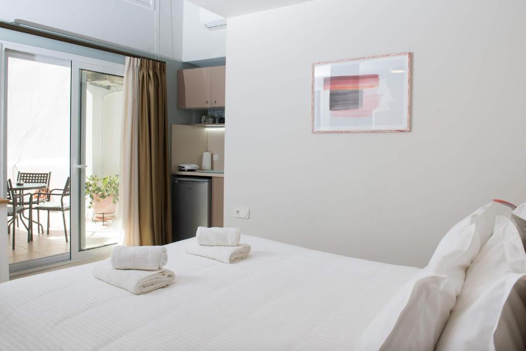 Ένα ή περισσότερα κρεβάτια σε δωμάτιο στο Stylish Studio Apartment - 8F House