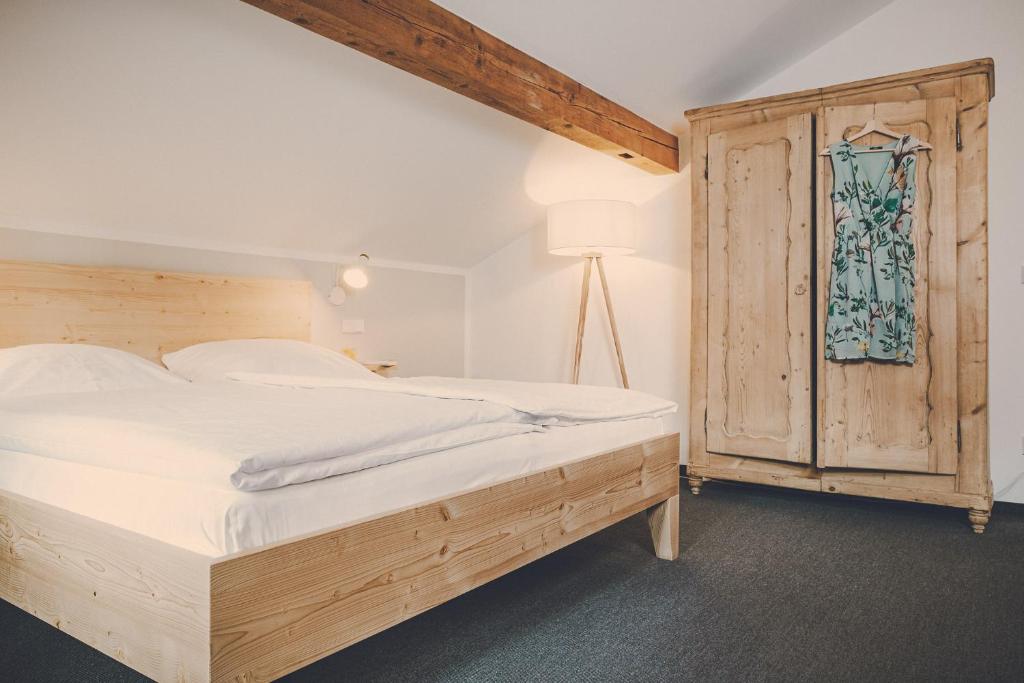 Postel nebo postele na pokoji v ubytování Der Lederer Hof - Boutique Apartments