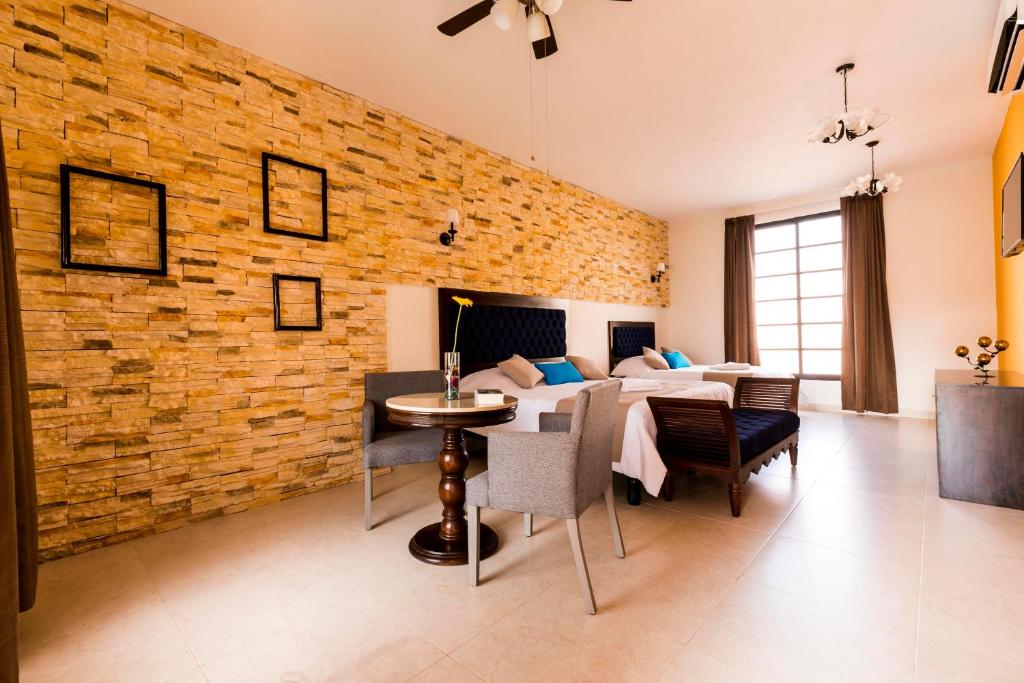 TV a/nebo společenská místnost v ubytování Hotel Los Frailes, Valladolid, Yucatán