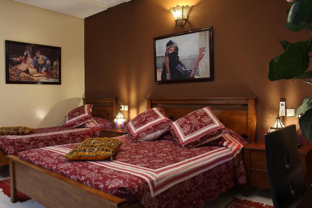 Postel nebo postele na pokoji v ubytování Riad Mimosa