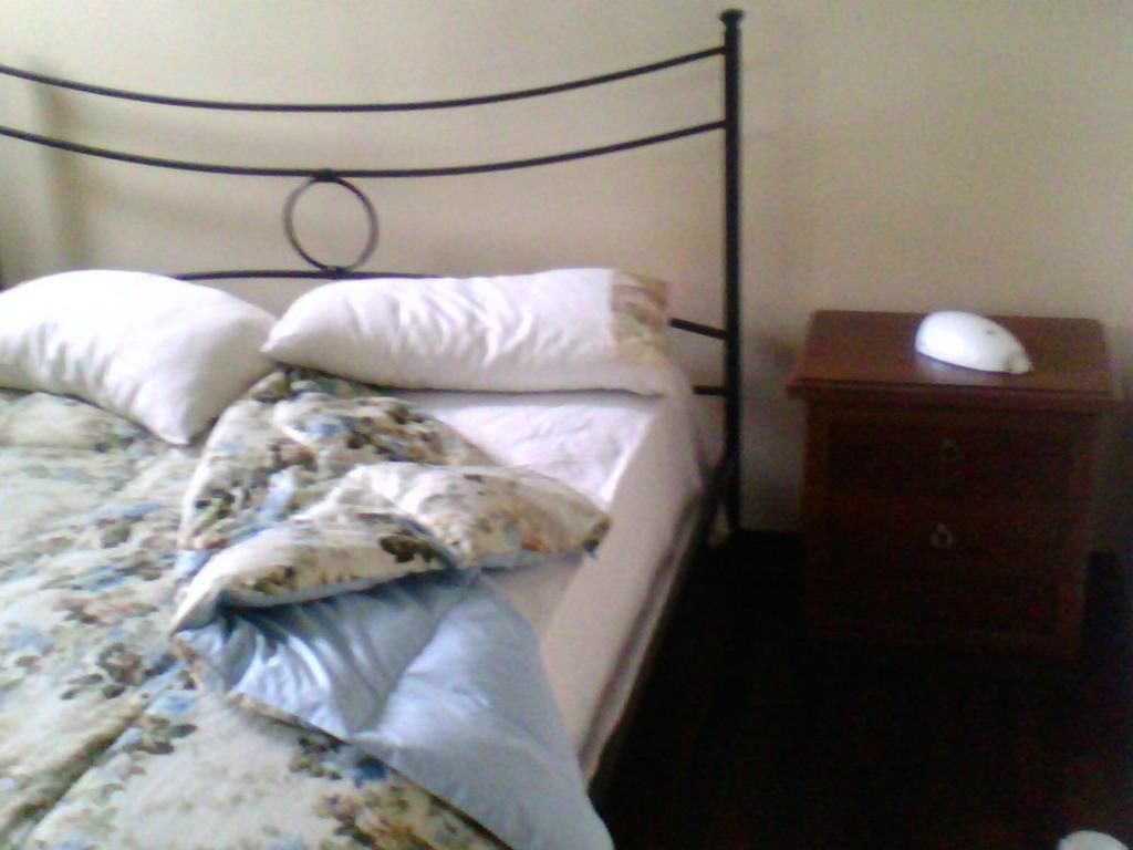 A bed or beds in a room at appartamento Prato Verde I