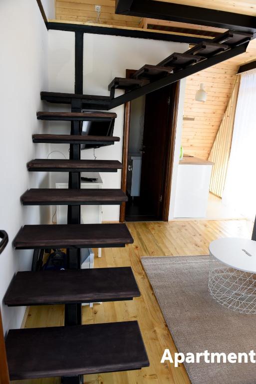 Palanda nebo palandy na pokoji v ubytování Lazar&Mila Apartments