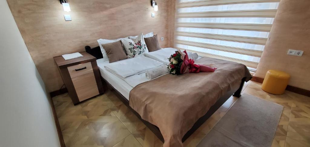 Postel nebo postele na pokoji v ubytování Cuki Residence
