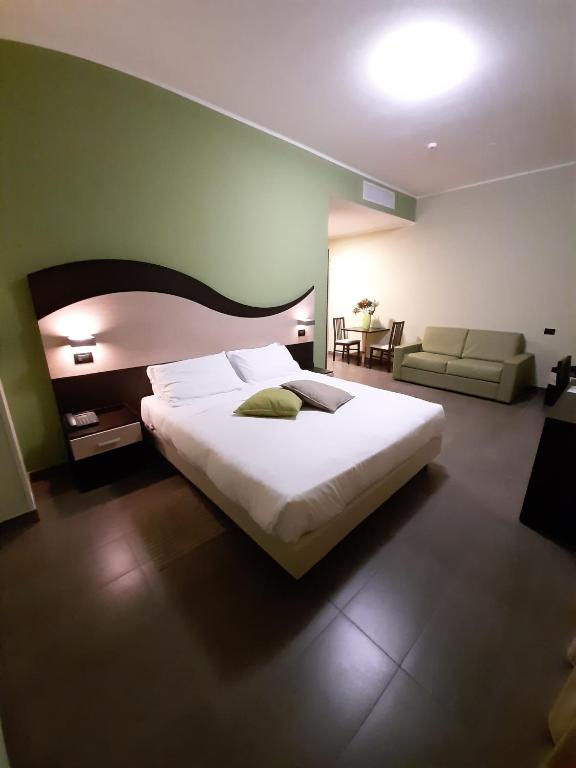 Posteľ alebo postele v izbe v ubytovaní Life Sport Hotel