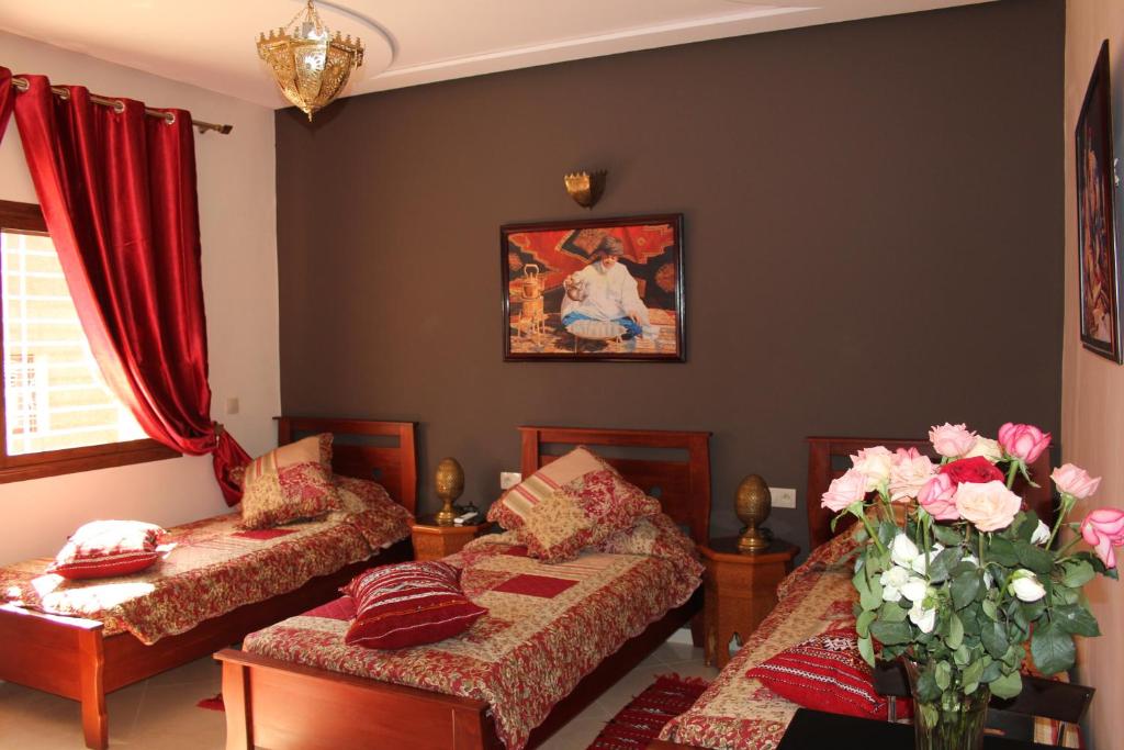 Postel nebo postele na pokoji v ubytování Riad Mimosa