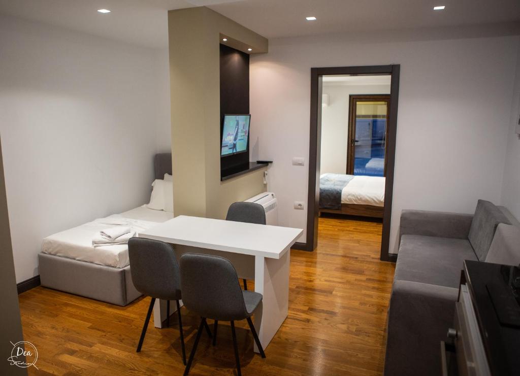 Postel nebo postele na pokoji v ubytování Suite Terrace Rooms & Apartments
