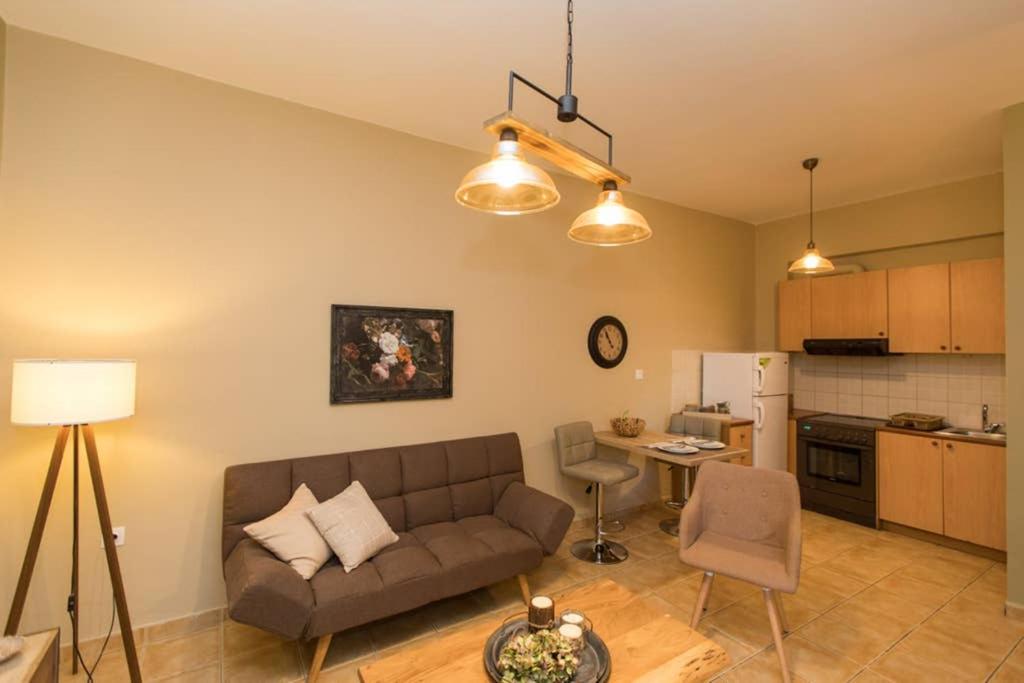 Kuchyň nebo kuchyňský kout v ubytování Kamaraki-Apartments