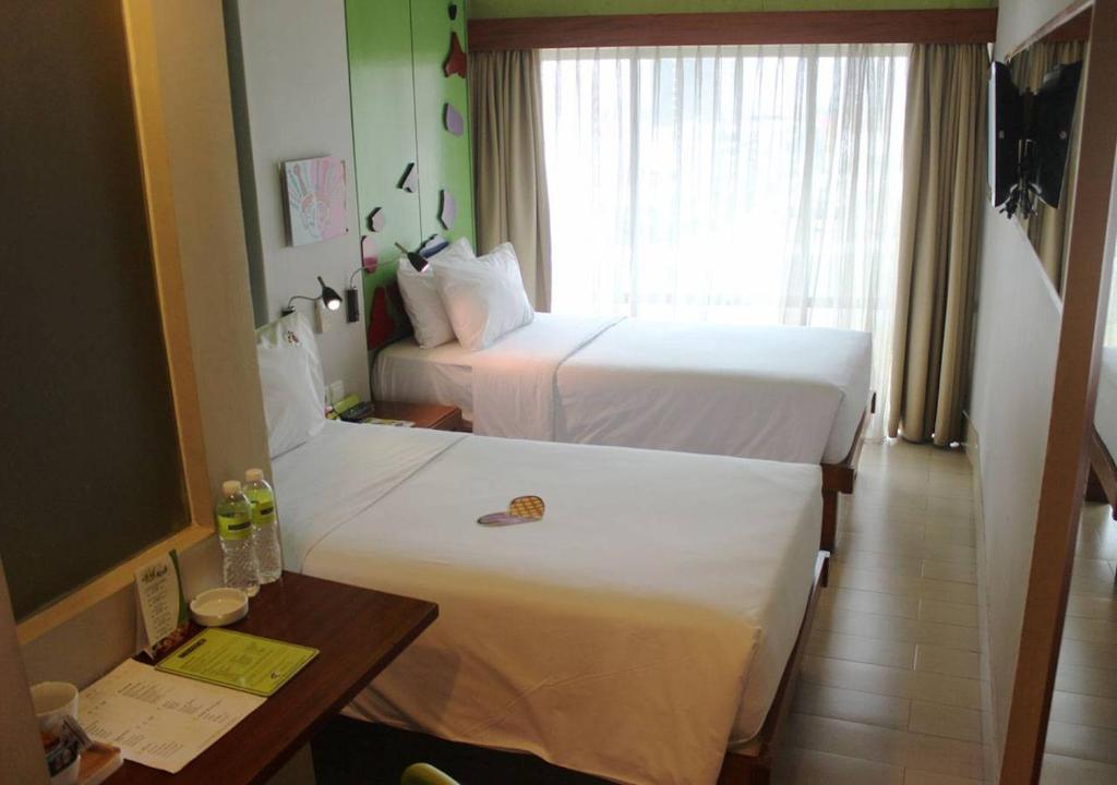 Katil atau katil-katil dalam bilik di MaxOneHotels.com at Sabang