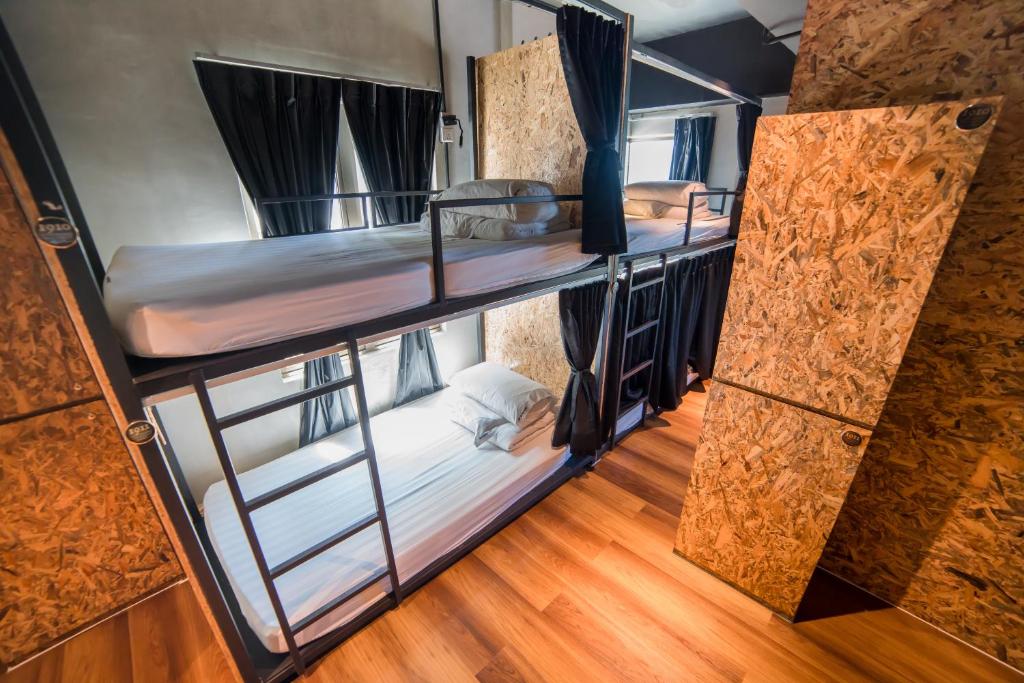 Postel nebo postele na pokoji v ubytování Homy Seafront Hostel