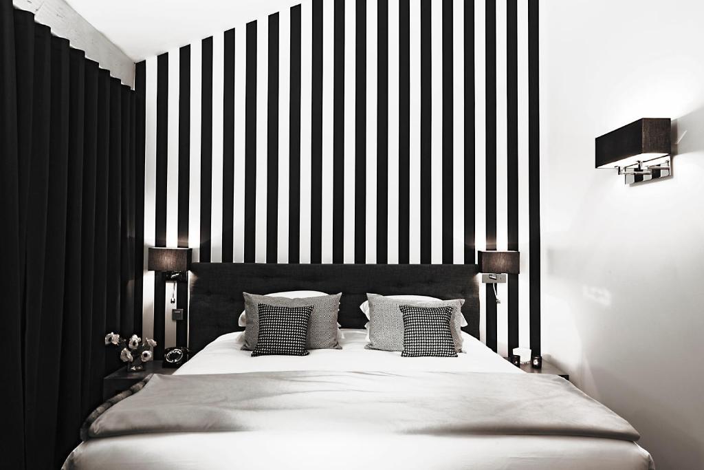 Postel nebo postele na pokoji v ubytování Maison D'Anthouard