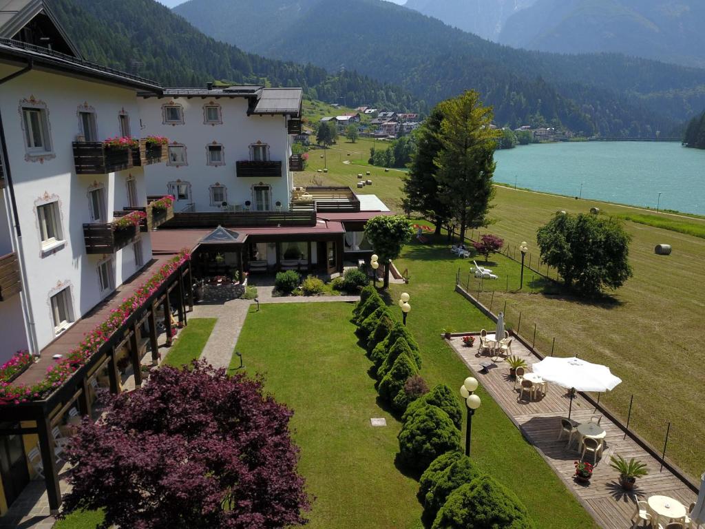 an aerial view of a building with a garden at Hotel Panoramic in Auronzo di Cadore