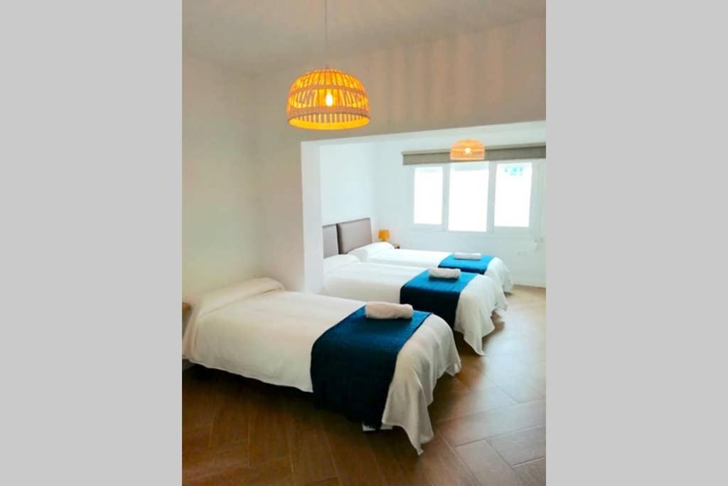 Posteľ alebo postele v izbe v ubytovaní VILLA LUNA Beach Premium 9PAX