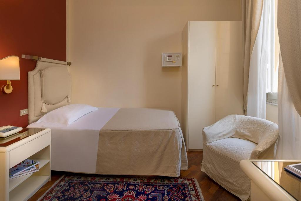 Postel nebo postele na pokoji v ubytování Grand Hotel Tettuccio