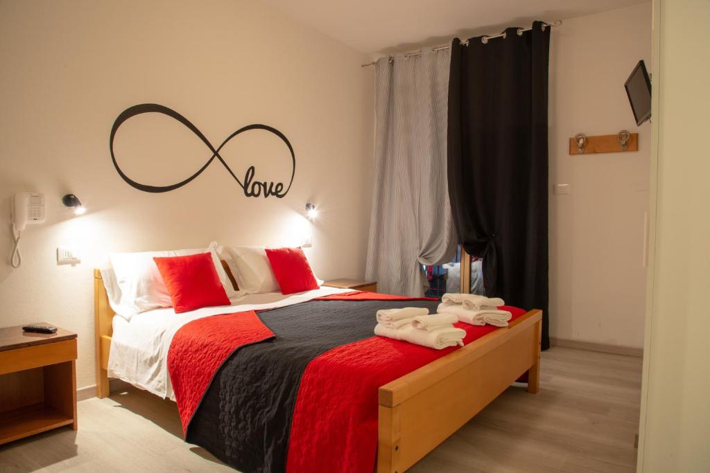 Postel nebo postele na pokoji v ubytování Infinity