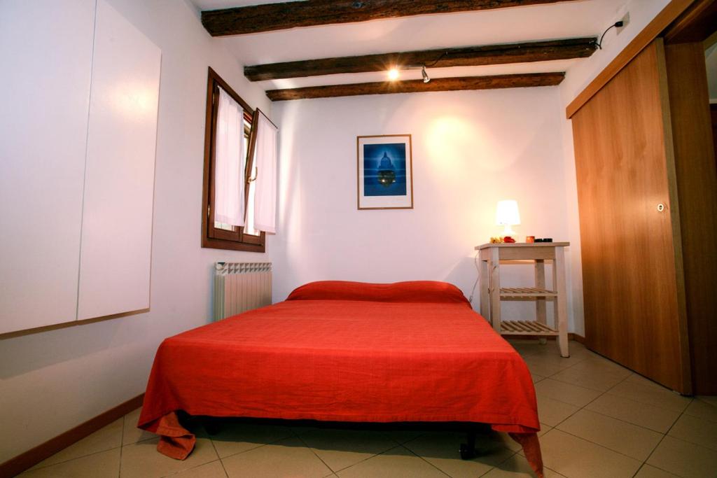 Postel nebo postele na pokoji v ubytování B&B Giardini