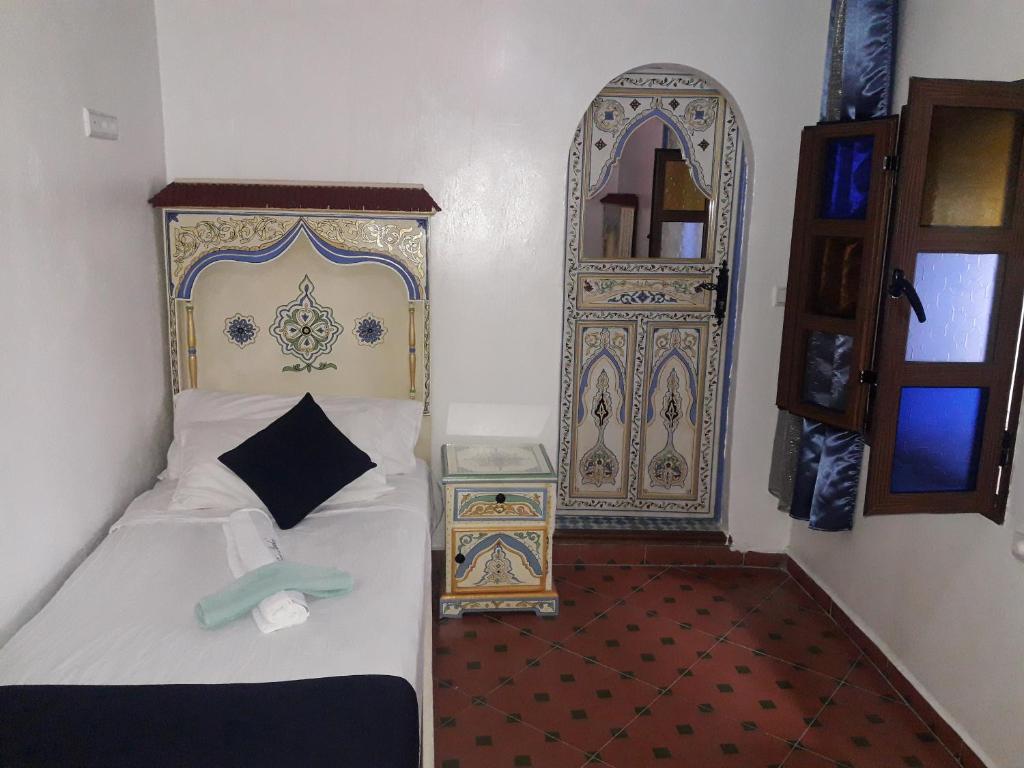 Postel nebo postele na pokoji v ubytování Casa El Haouta