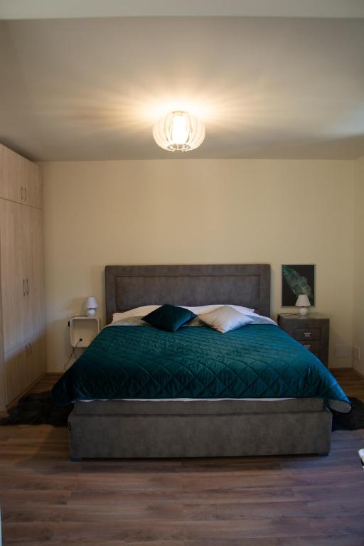 Postel nebo postele na pokoji v ubytování Zvjezdana dolina Garni hotel