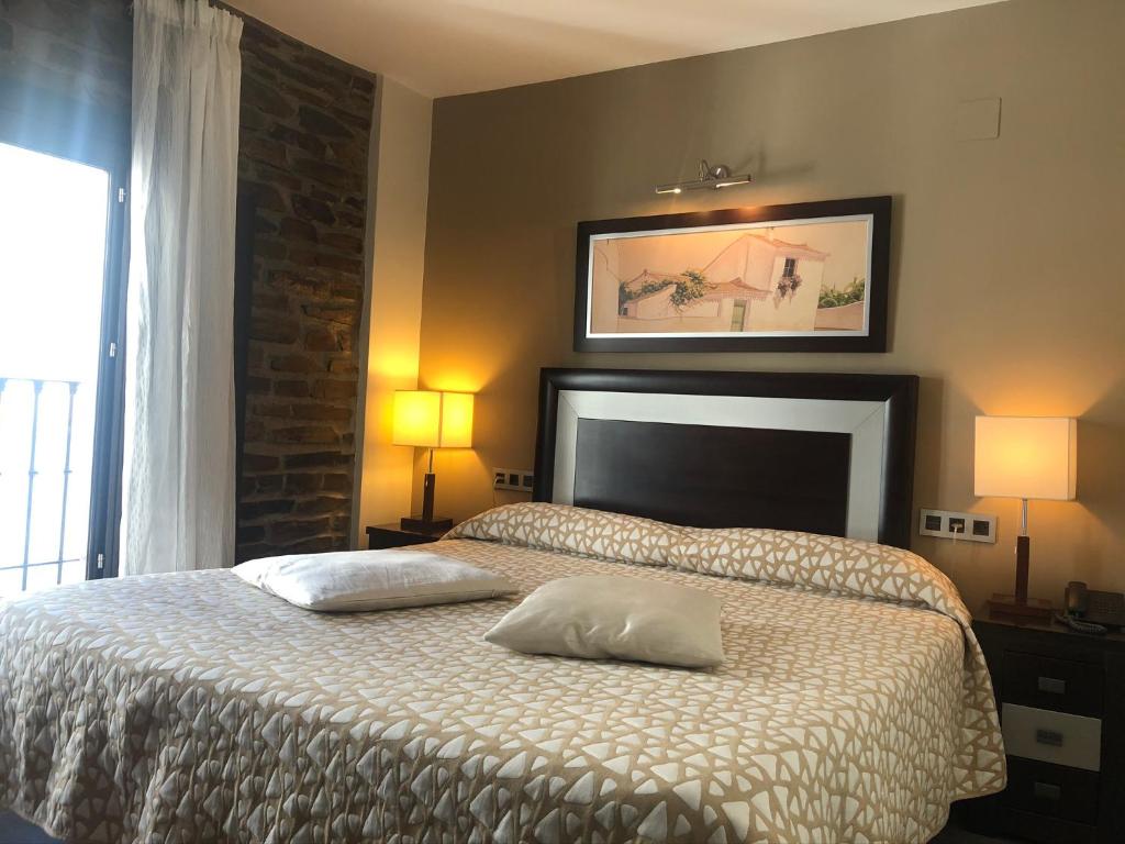 Postel nebo postele na pokoji v ubytování Hotel Rural Real de Poqueira