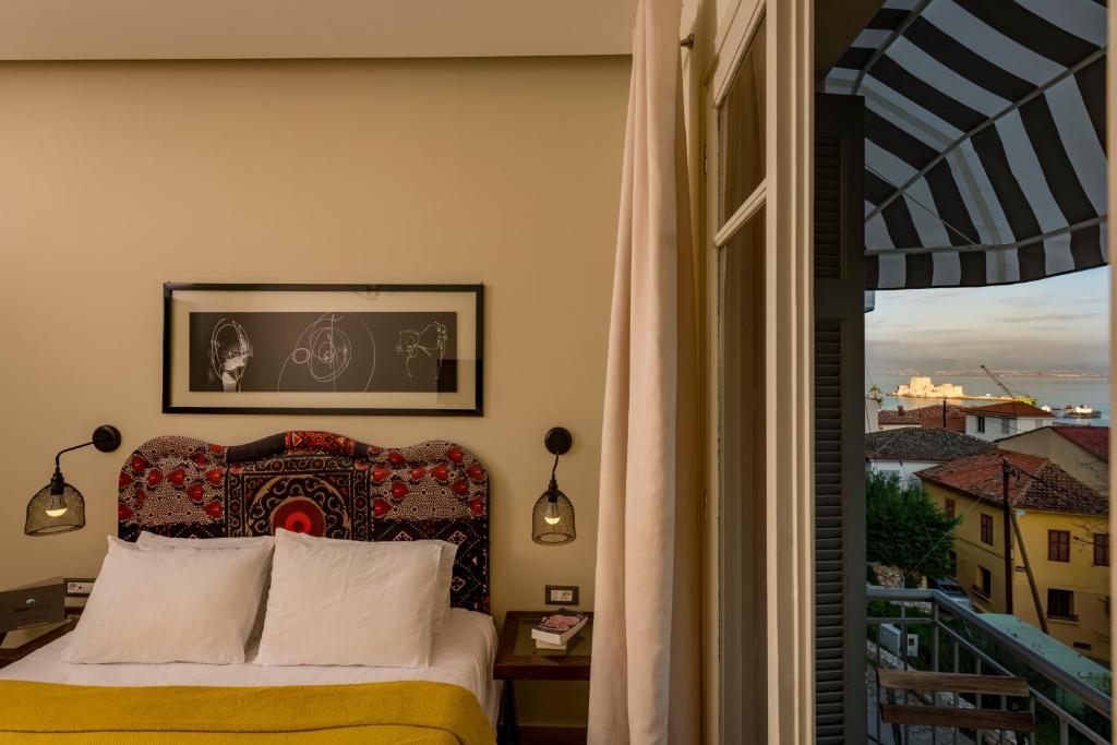 Postel nebo postele na pokoji v ubytování Leto Nuevo Hotel