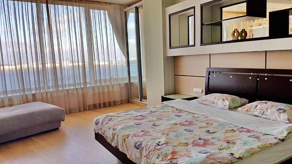 Postel nebo postele na pokoji v ubytování Most City Apart-Hotel