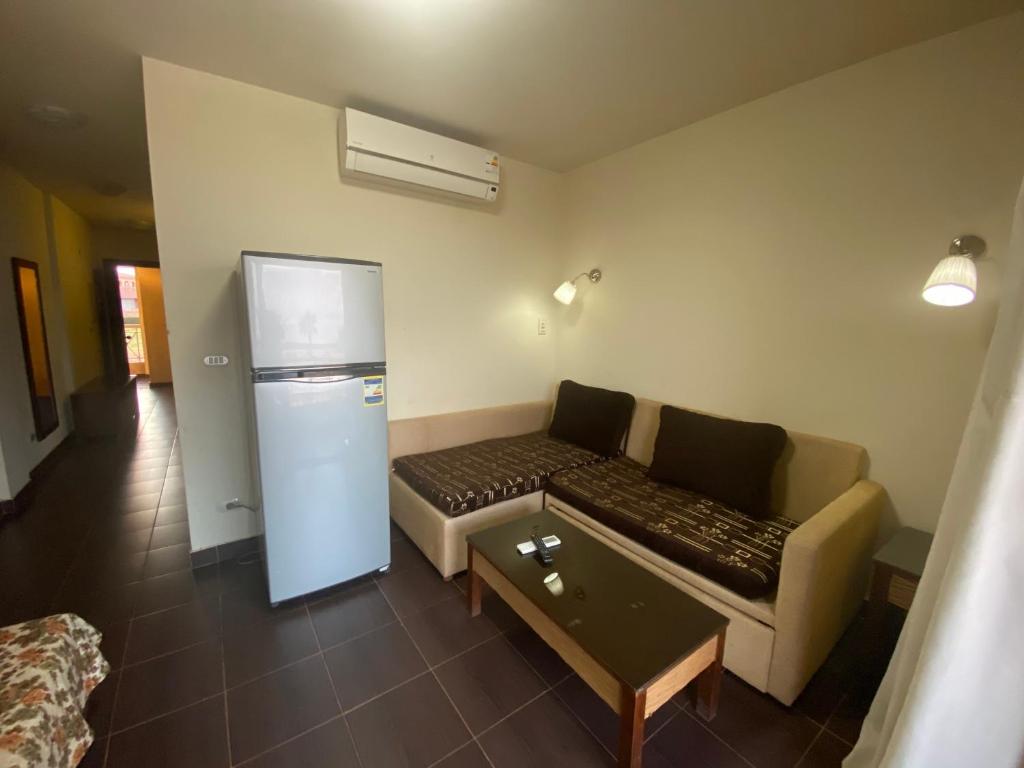 A kitchen or kitchenette at Porto South Beach Royal Sea view families صف اول بحر مباشر