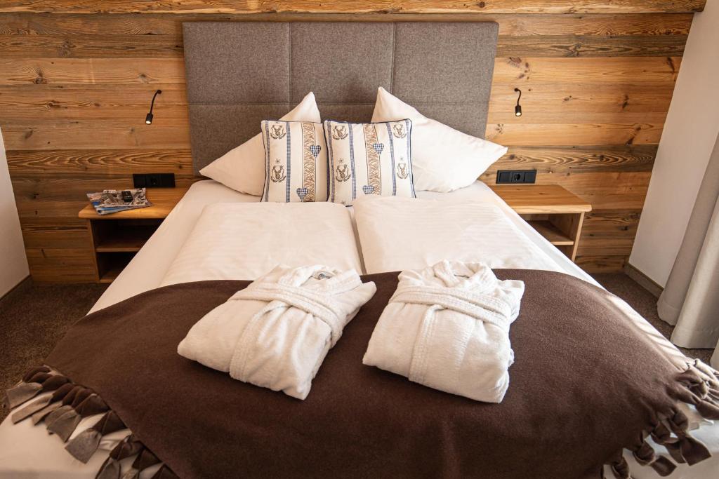 Postel nebo postele na pokoji v ubytování Gästehaus Fellner