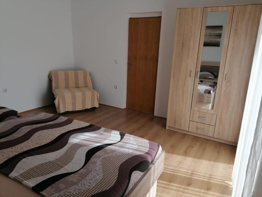 Posteľ alebo postele v izbe v ubytovaní Apartment Niva