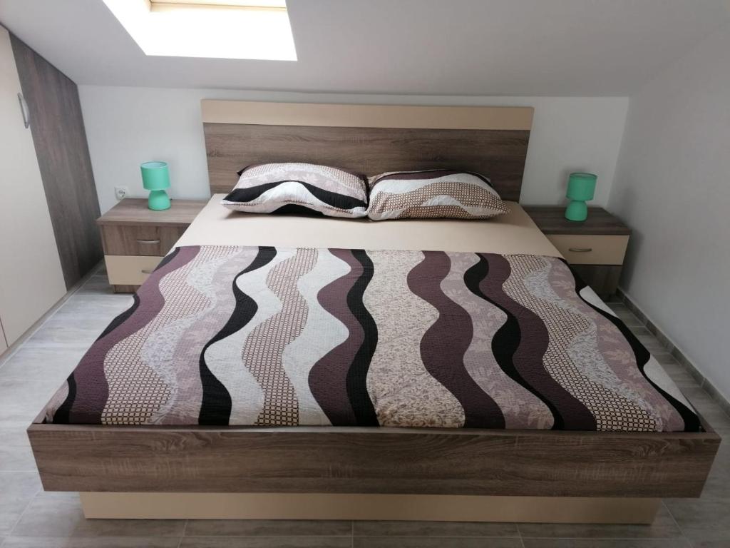 Posteľ alebo postele v izbe v ubytovaní Apartment Niva