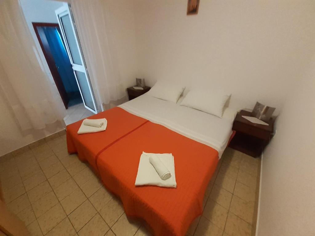 Posteľ alebo postele v izbe v ubytovaní Apartments Slavica