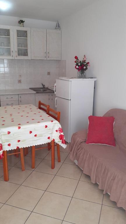 Kuchyňa alebo kuchynka v ubytovaní Apartments Slavica