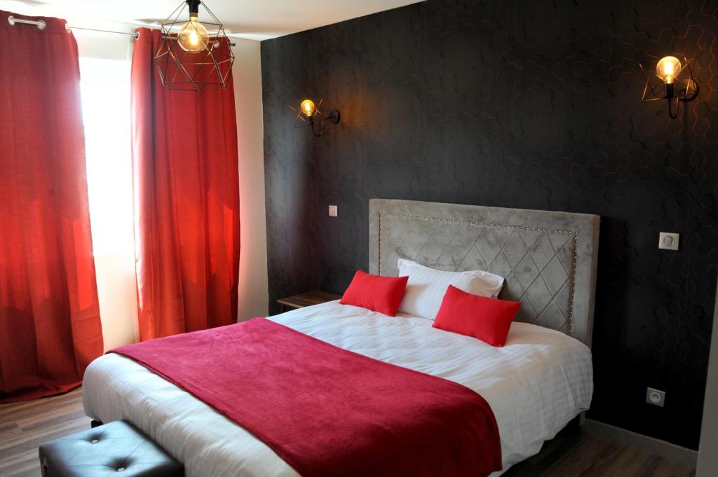 Postel nebo postele na pokoji v ubytování Hôtel L'ange de la vallée