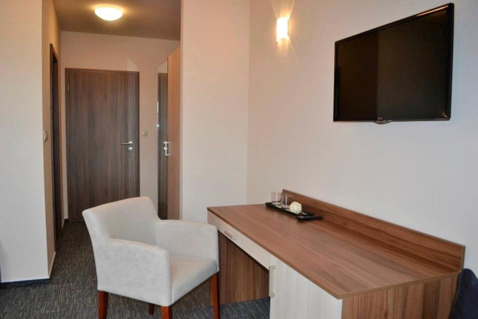 A television and/or entertainment centre at Penzion Lipa