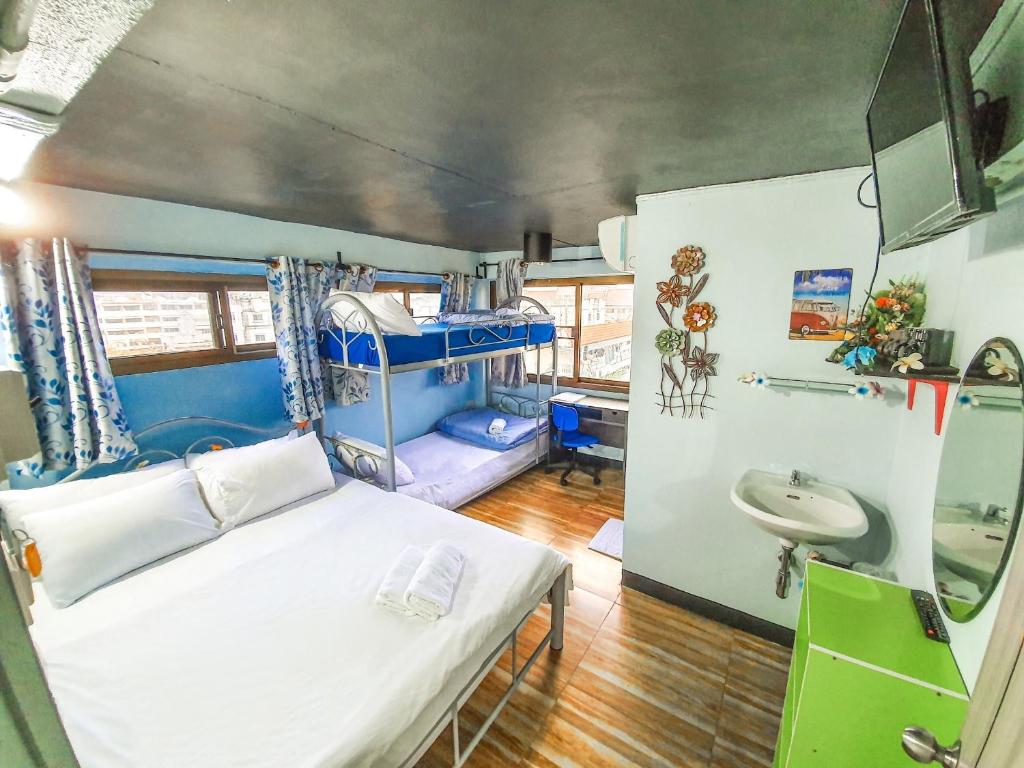 Postel nebo postele na pokoji v ubytování Bangkok Canale Home at Khaosarn