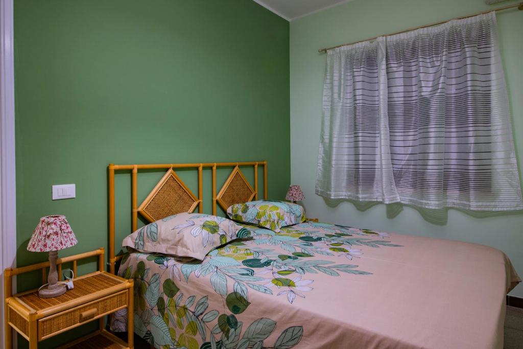 Postel nebo postele na pokoji v ubytování Residence l'Ogliastro