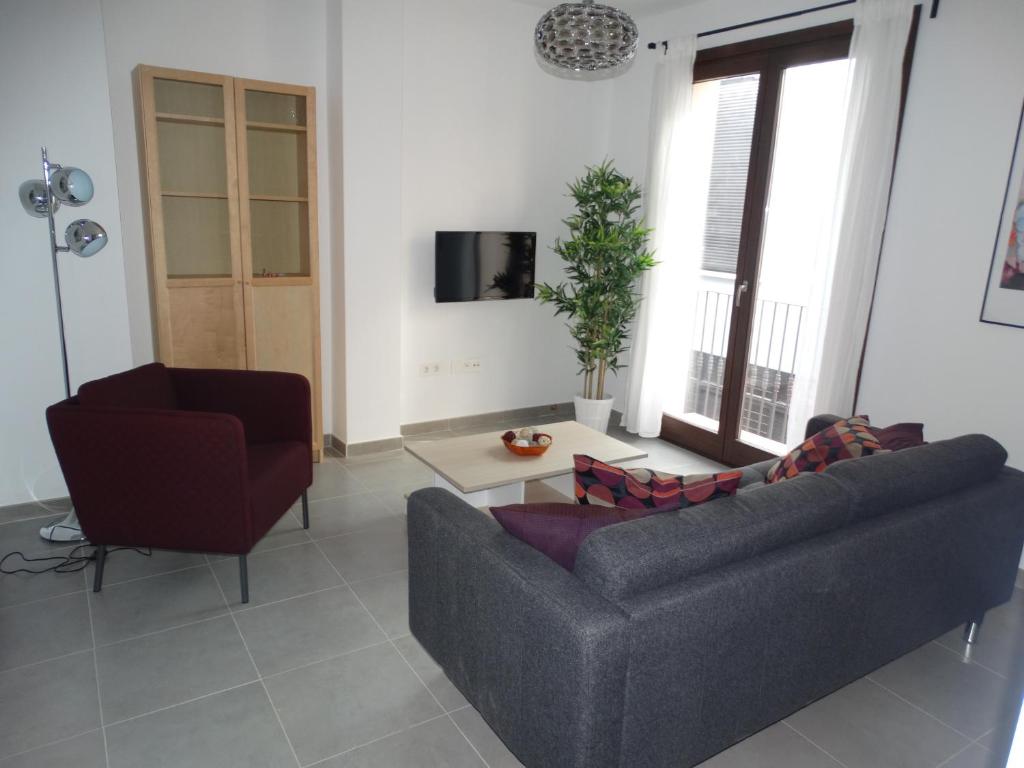 Televízia a/alebo spoločenská miestnosť v ubytovaní Málaga Apartamentos - Jinetes, 23