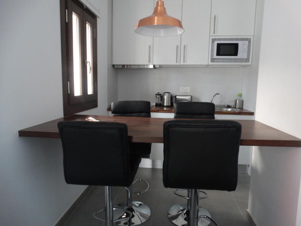 Kuchyňa alebo kuchynka v ubytovaní Málaga Apartamentos - Jinetes, 23