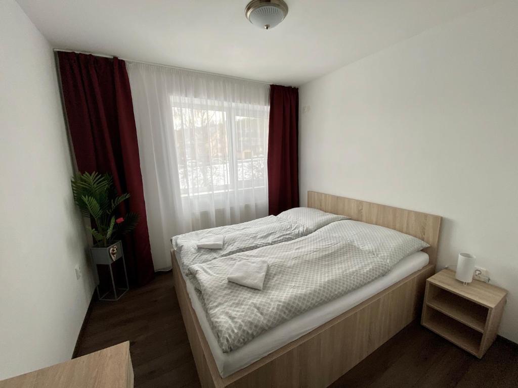 Postel nebo postele na pokoji v ubytování Penzión Fistra