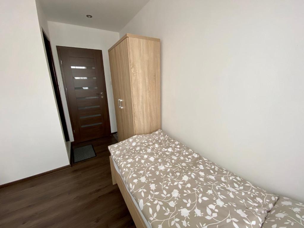 Postel nebo postele na pokoji v ubytování Penzión Fistra