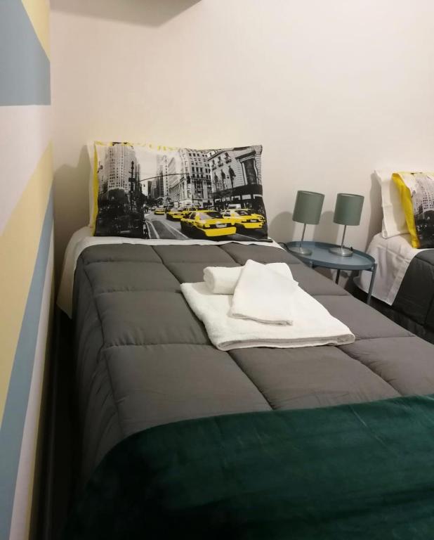 Łóżko lub łóżka w pokoju w obiekcie Annetta home