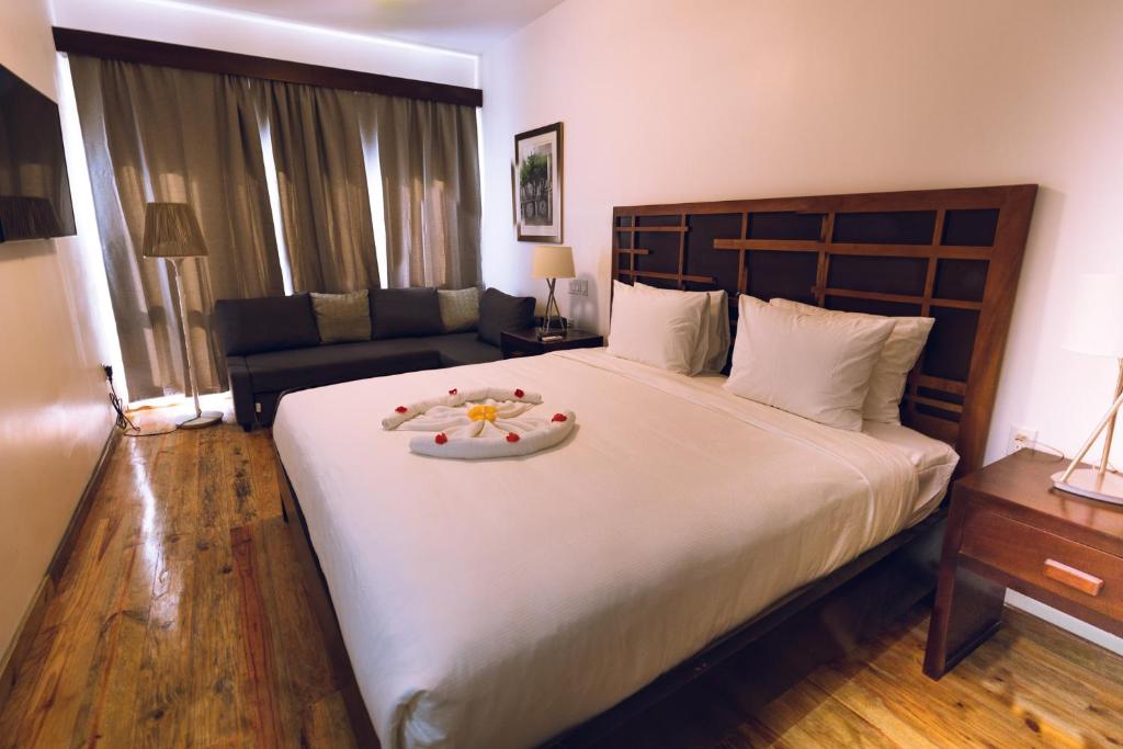 Postel nebo postele na pokoji v ubytování La Placita Inn